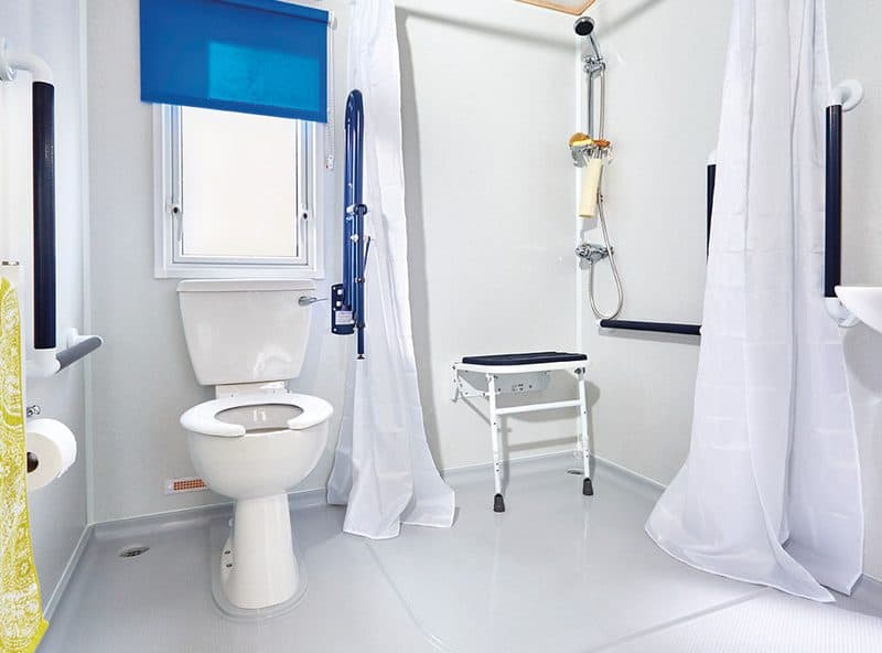 Accessible bathroom with safety features and modern design.