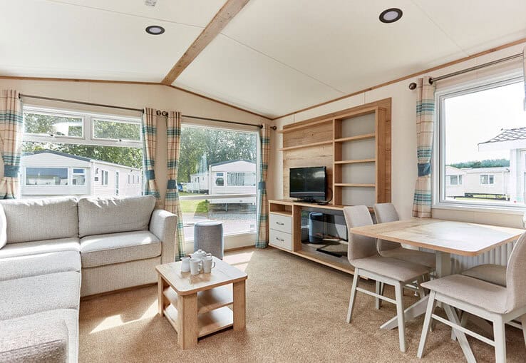 Bright, modern mobile home interior with cozy living space.