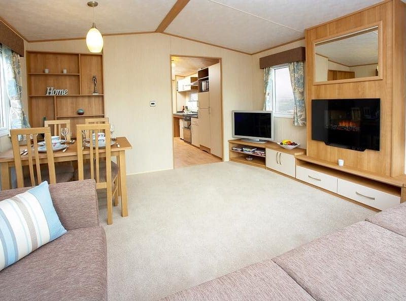 Cozy, modern living room with dining area and kitchen view.