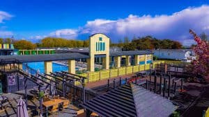 Colorful outdoor swimming pool facility on sunny day.