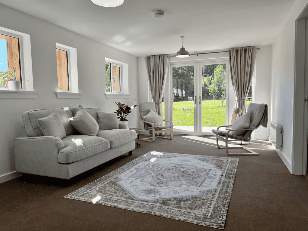 Bright modern living room with garden view