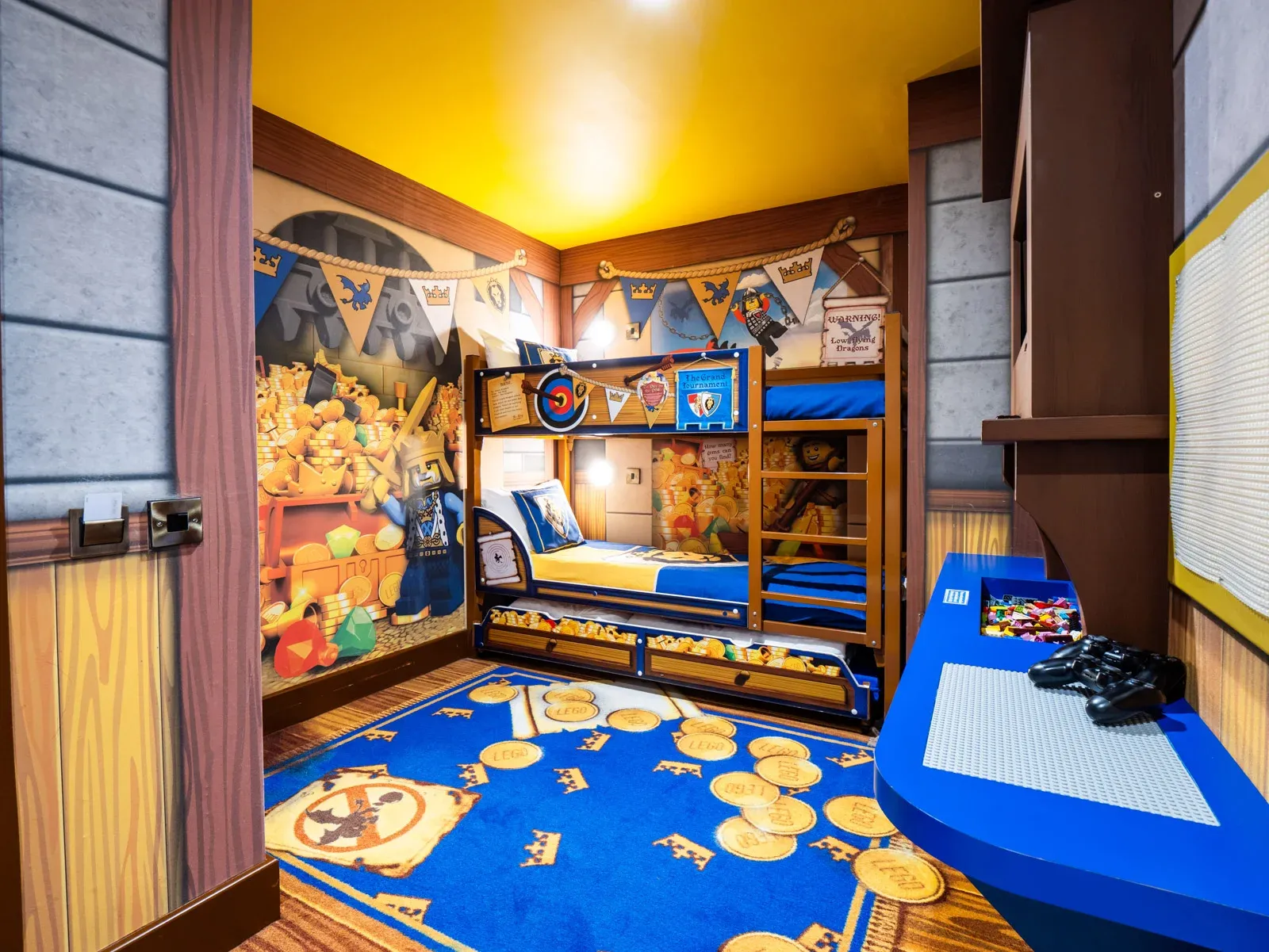 Colorful kids' room with superhero-themed decor and bunk bed