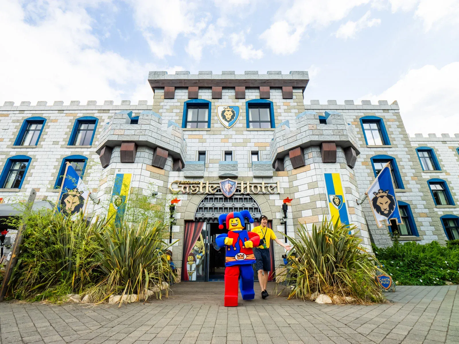 Lego figure outside themed Castle Hotel entrance