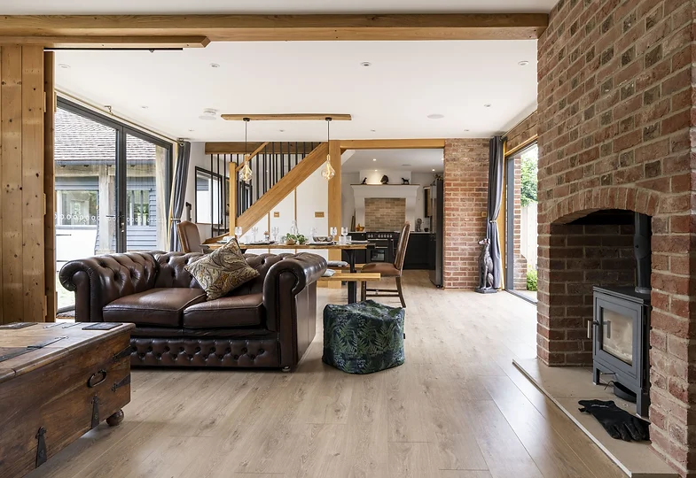Rustic Living room with large open plan space and log burner