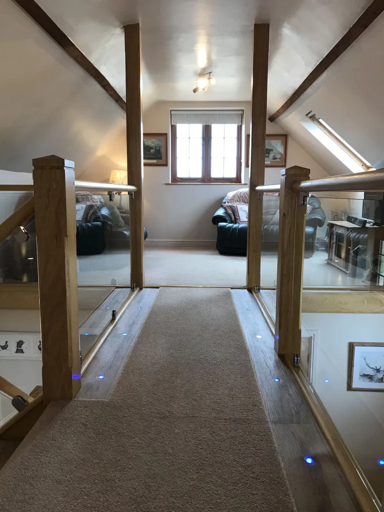 First Floor landing with seating and glass balastrade
