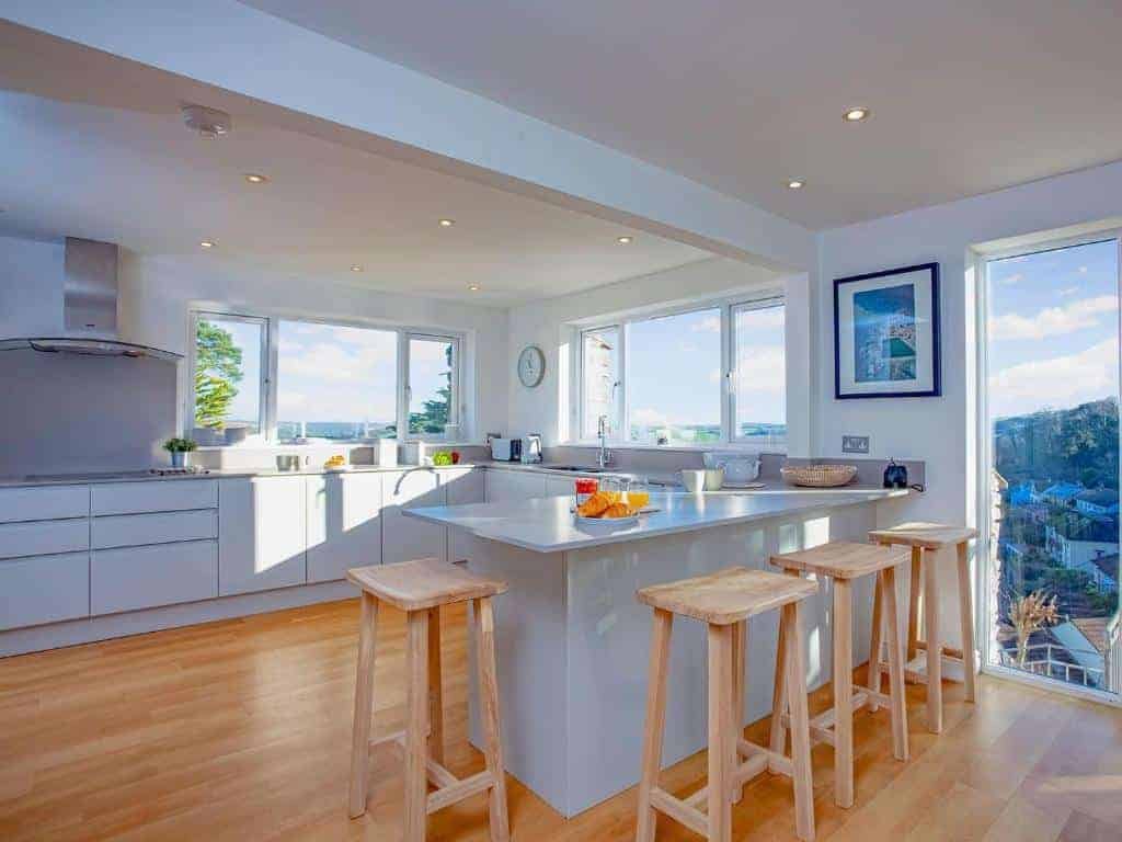 Bright kitchen with ocean view and modern appliances