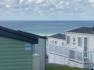 Coastline view between two mobile homes