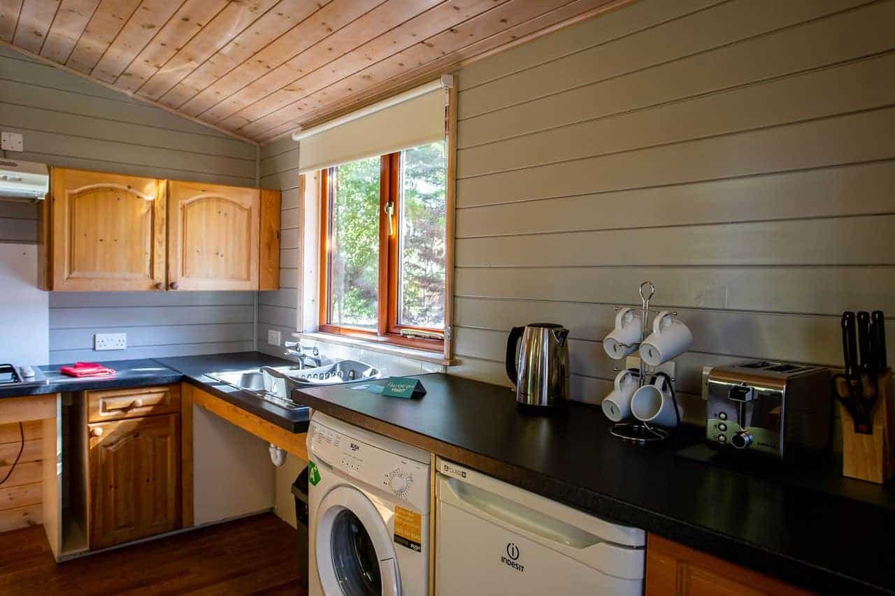 Cozy kitchen interior with wooden cabinets and modern appliances