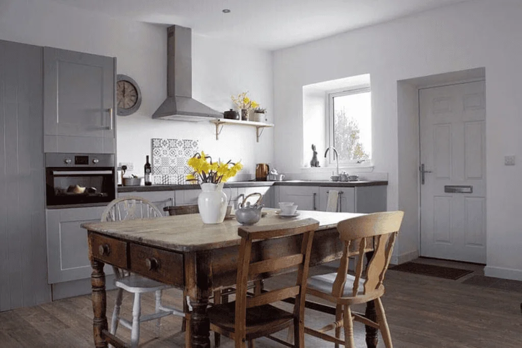 Modern kitchen interior with wooden furniture and sunlight