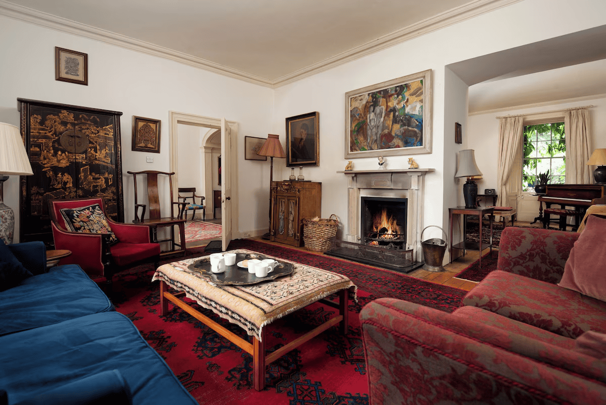 Elegant living room with fireplace and vintage furnishings