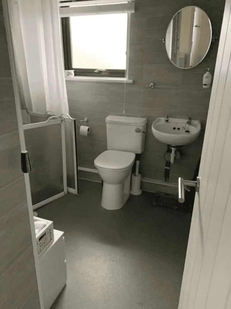Modern bathroom interior with toilet and sink
