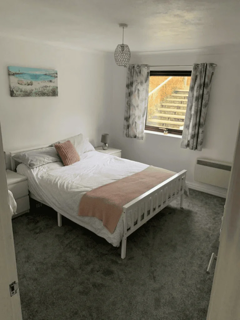 Cozy bedroom with modern decor and natural light