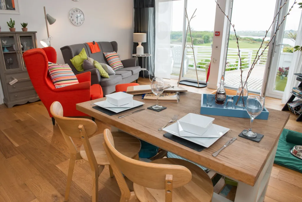Cozy dining area with modern furniture and scenic view
