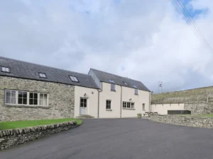 Renovated stone farmhouse with paved courtyard