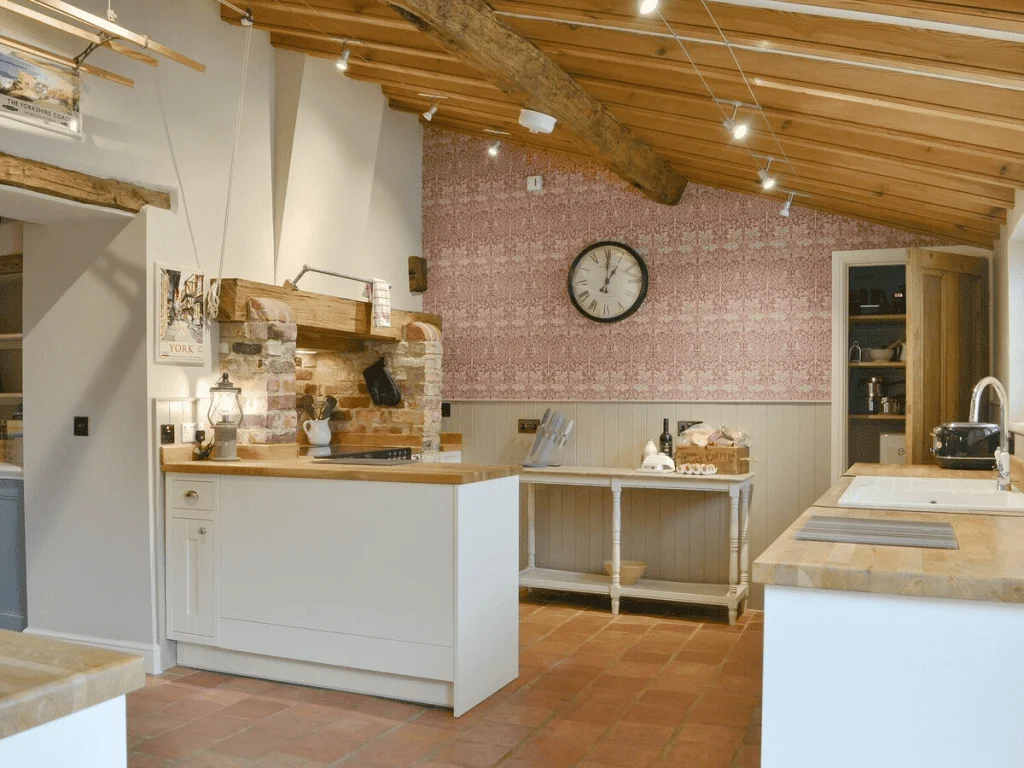 Rustic kitchen interior with wooden beams and stone accents