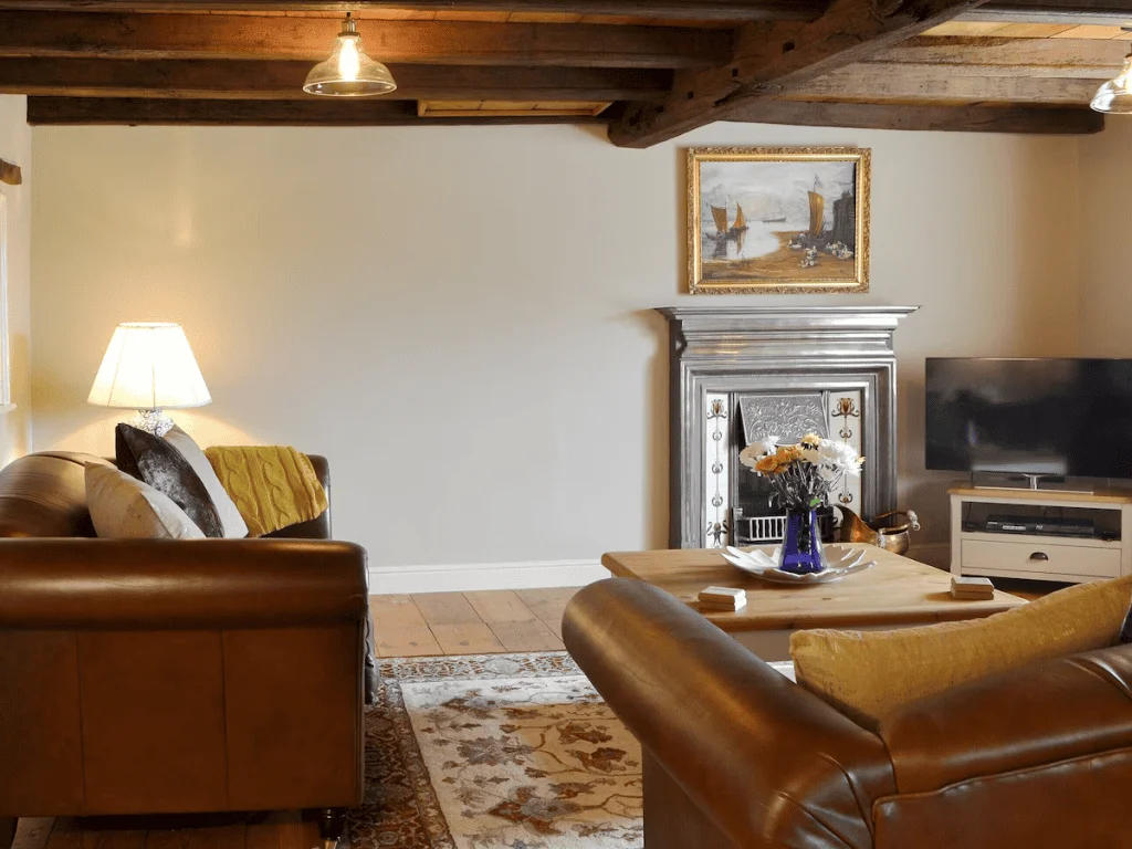 Cozy living room with fireplace and stylish furniture