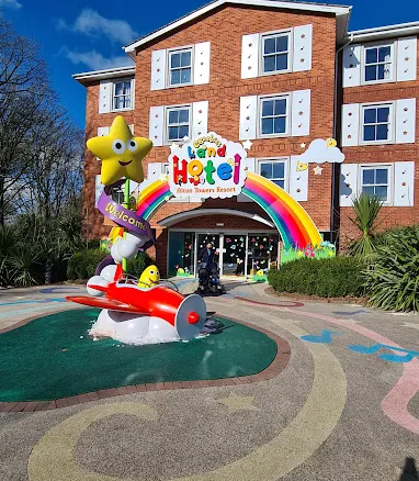 Family-friendly hotel entrance with rainbow decorations