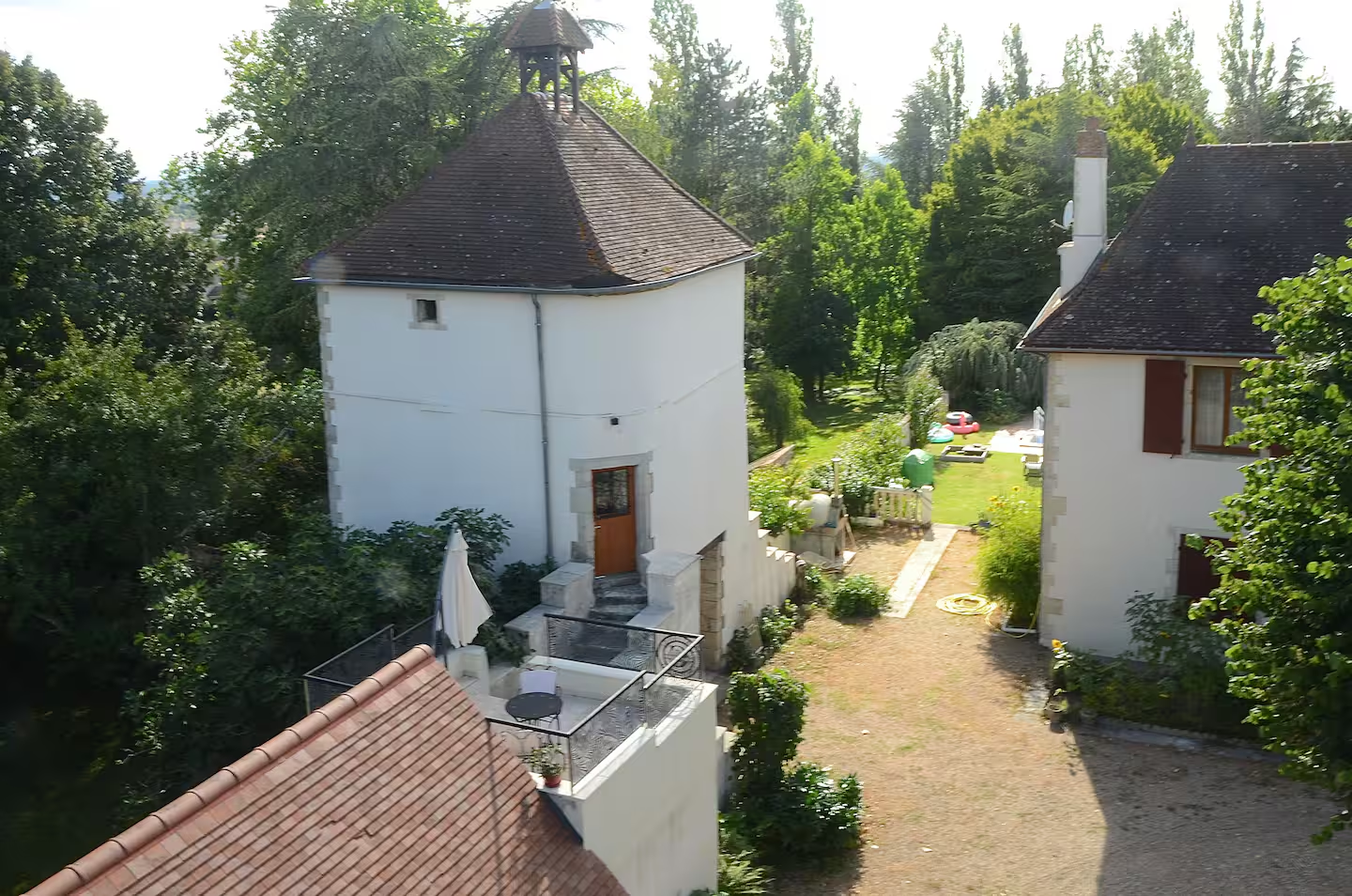 Countryside house with garden and trees