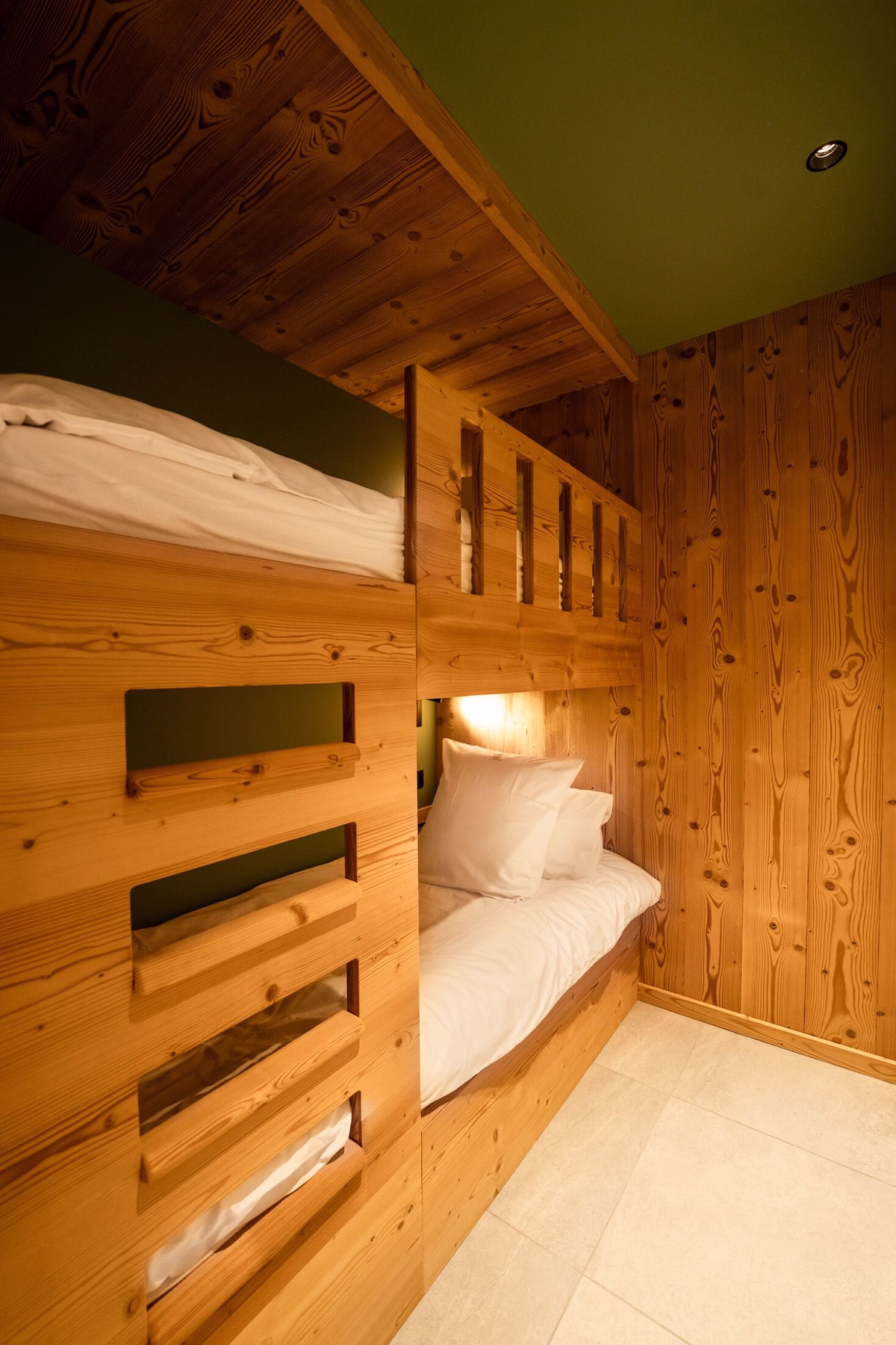 Wooden bunk beds in cosy room