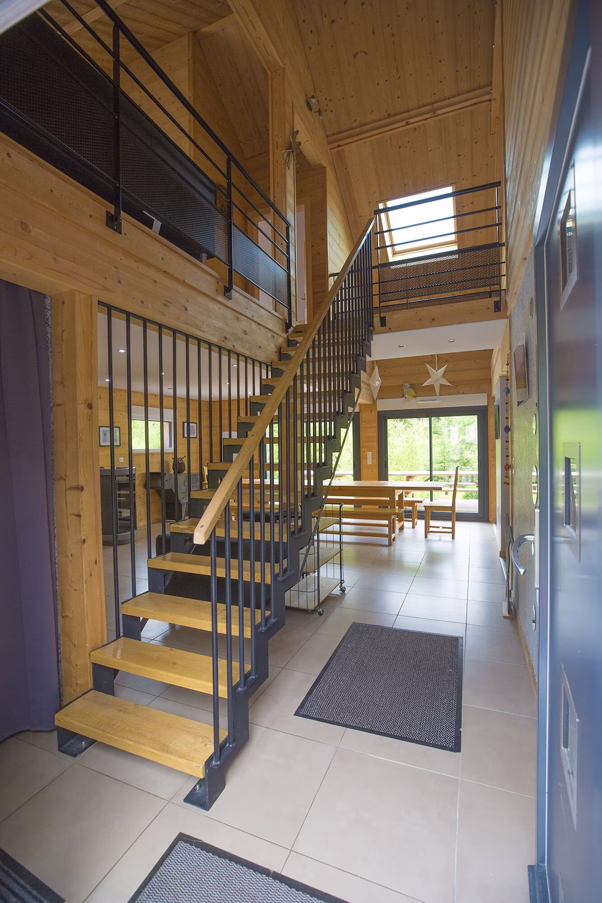 Modern wooden staircase in a bright interior space.